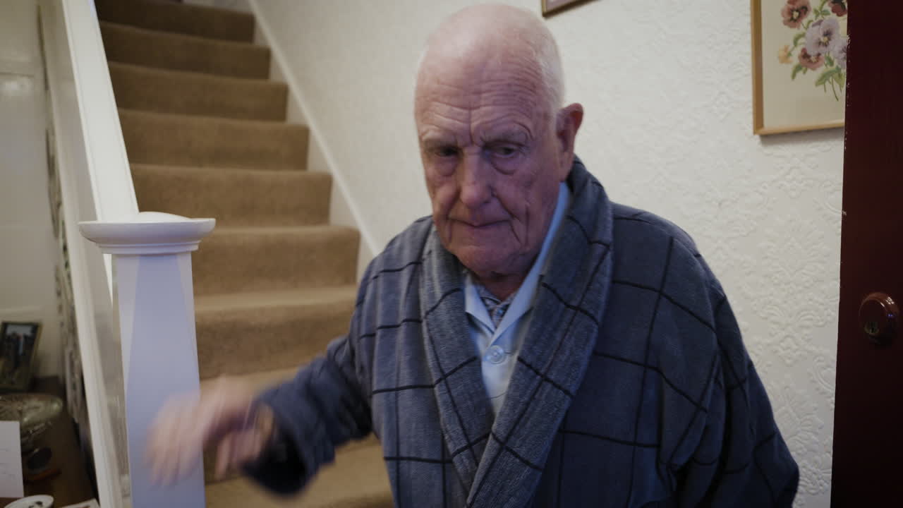 Elderly Man on Staircase