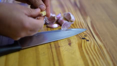 slicing onion chopping into julienne on wooden board kitchen healthy healthy diet