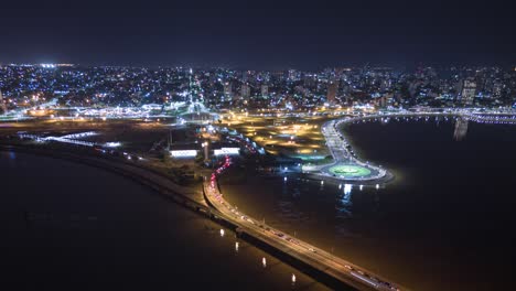 Night-hyperlapse-of-the-wonderful-coastal-town-of-Posadas,-Misiones,-Argentina