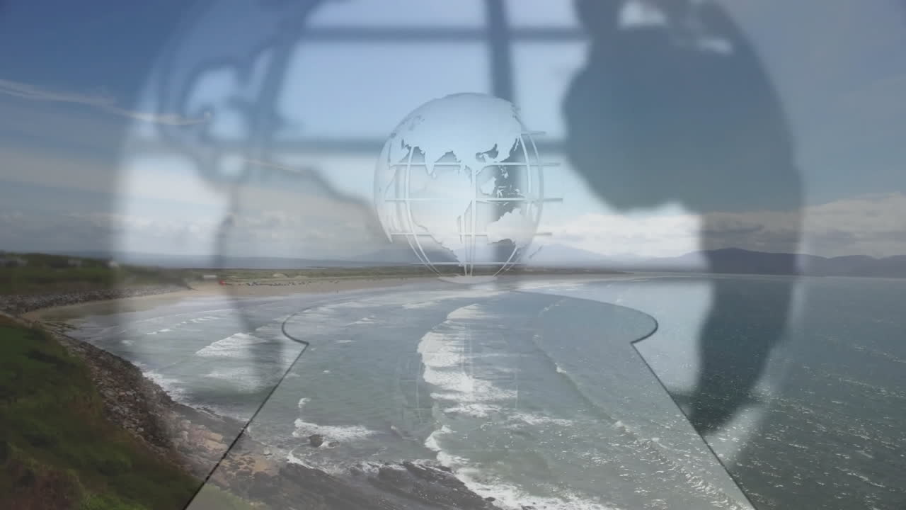 Globe and keyhole animation over coastal landscape with waves and cliffs