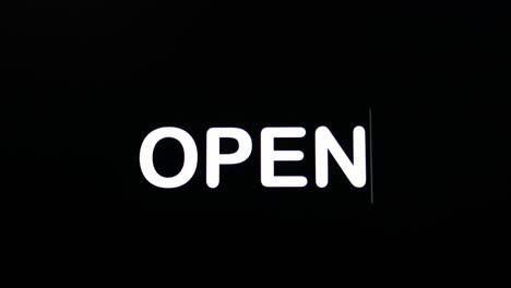 text written on black screen with the word open in white