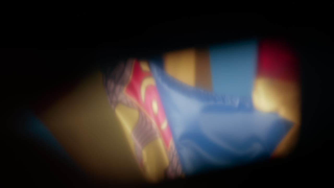 Soft focus close up of the Moldovan flag waving in the wind