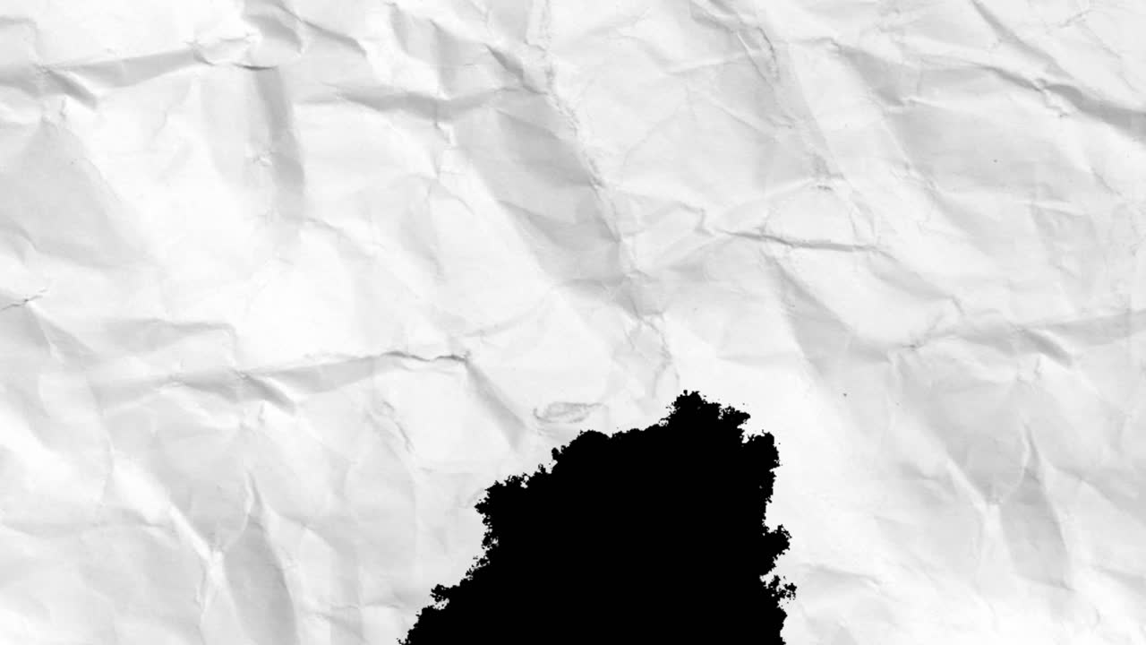 Crumpled White Paper Transition on Black Background