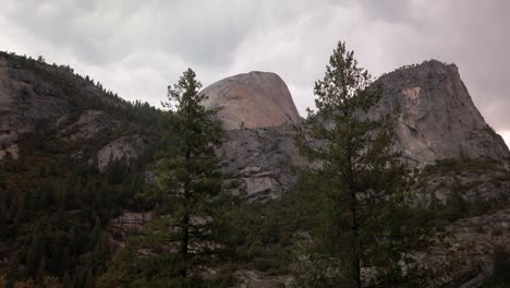 tilting up shot to reveal the backside of half dome in yosemite valley