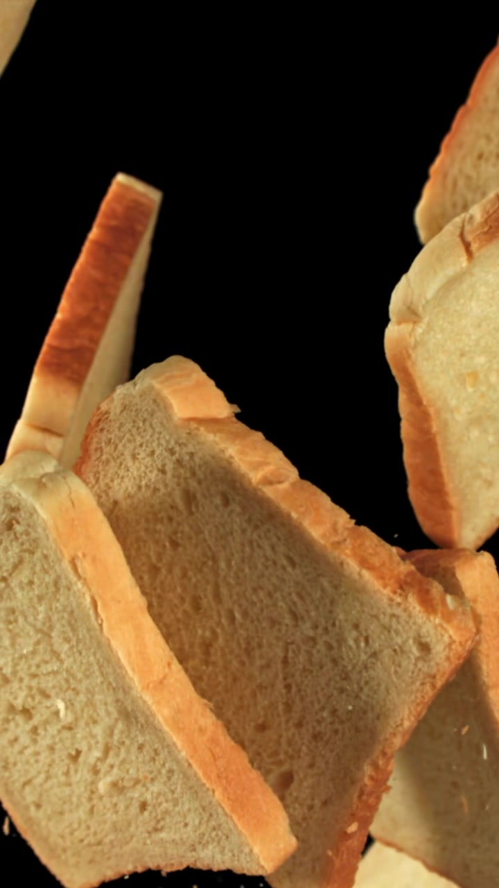 Slices of White Bread Falling in Slow Motion