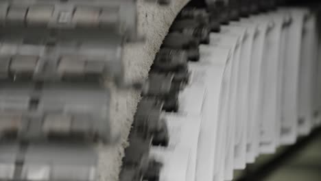 newspapers move along a conveyor belt at a newspaper factory 6