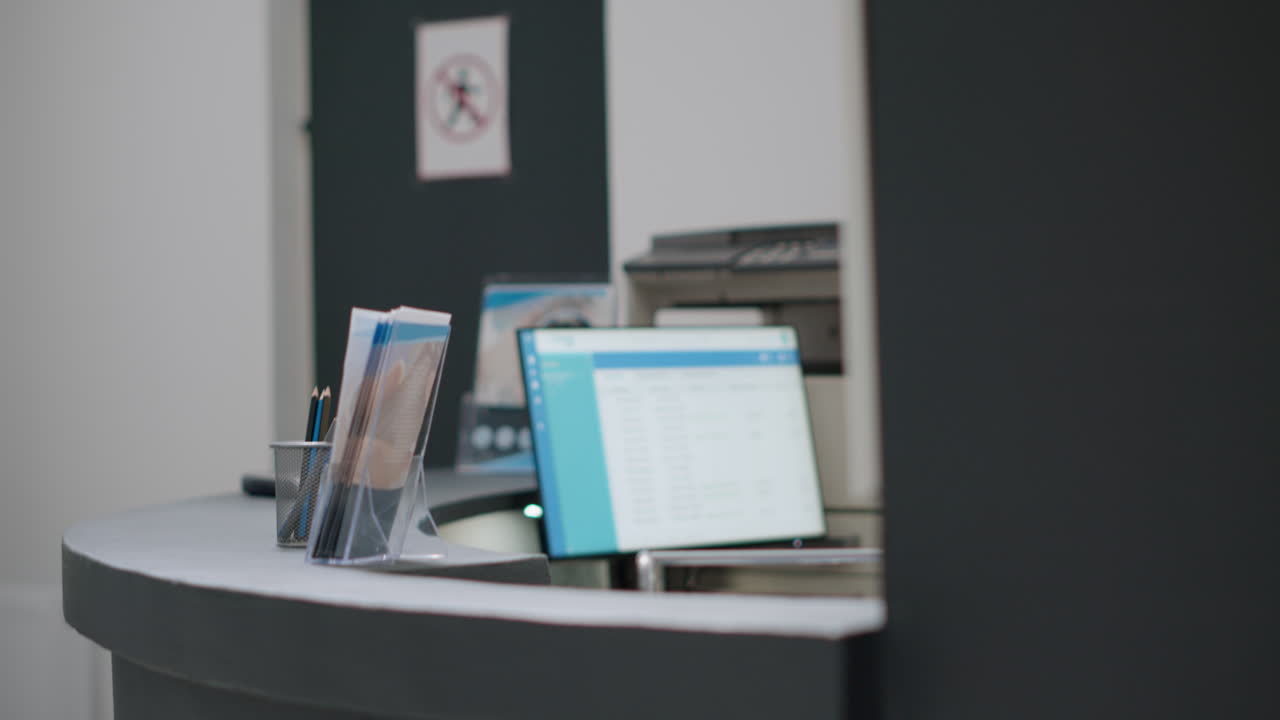 Reception desk with computer and printer