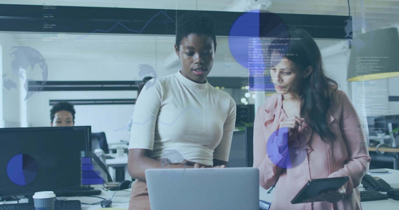 Two women discussing work over digital data processing animation in office