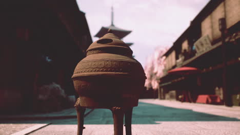 japanese incense burner in a traditional town setting