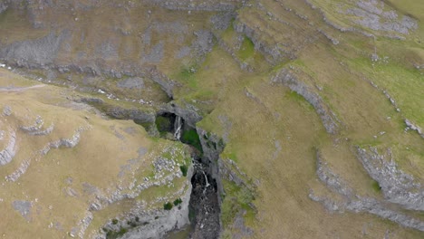 aeriel footage gordale scar is a limestone ravine near malham, north yorkshire, england