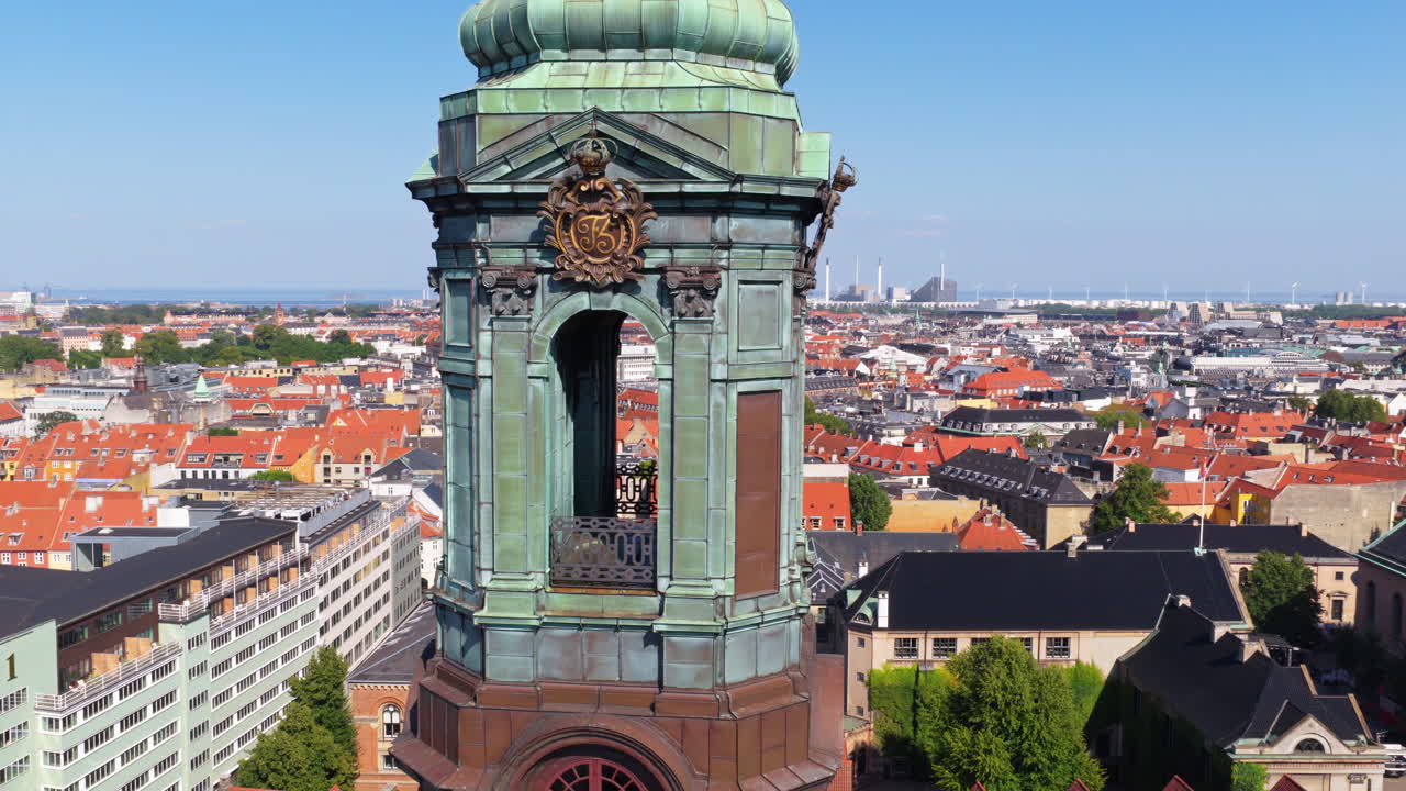 Aerial drone view of the copper tower of Christiansborg Palace with panoramic views of central Copenhagen, Denmark