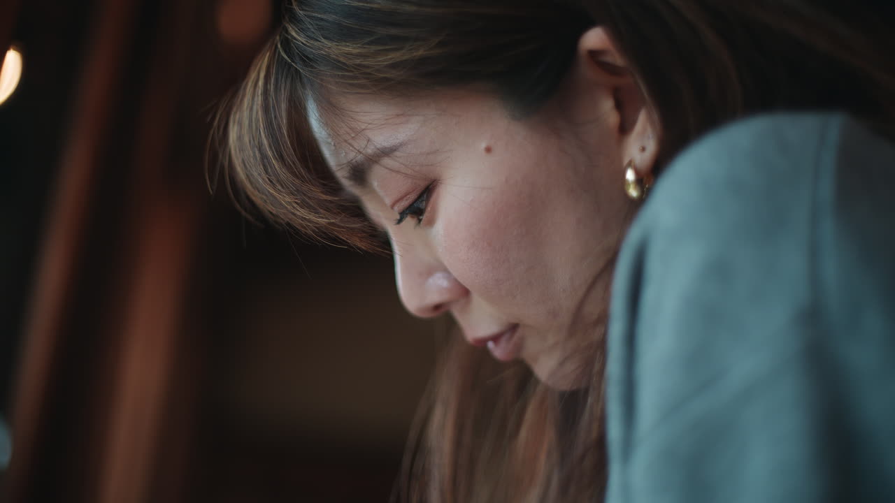Close-up portrait of an Asian woman