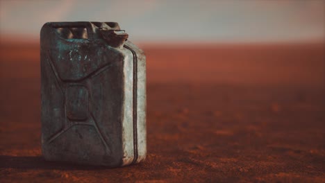 old rusty fuel canister in the desert