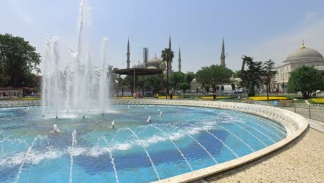 aya sofia mosque in istanbul with a fountain in the foreground