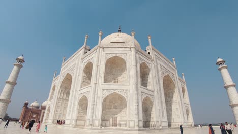 establishing view of the majestic taj mahal in the ivory-white marvelous splendor  - wide front tilt-down shot