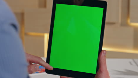office manager using mockup tablet searching information in internet close up.