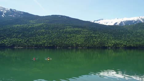 people kayaking in lake 4k