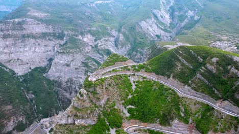 Aerial-of-highway-with-hairpin-bends-from-Shkoder-to-Vermosh-in-Albanian-mountains