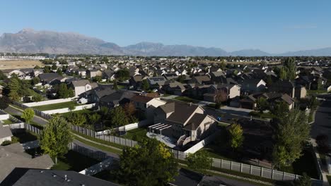 urban sprawl as suburban developments grow to meet housing shortages in lehi, utah - aerial