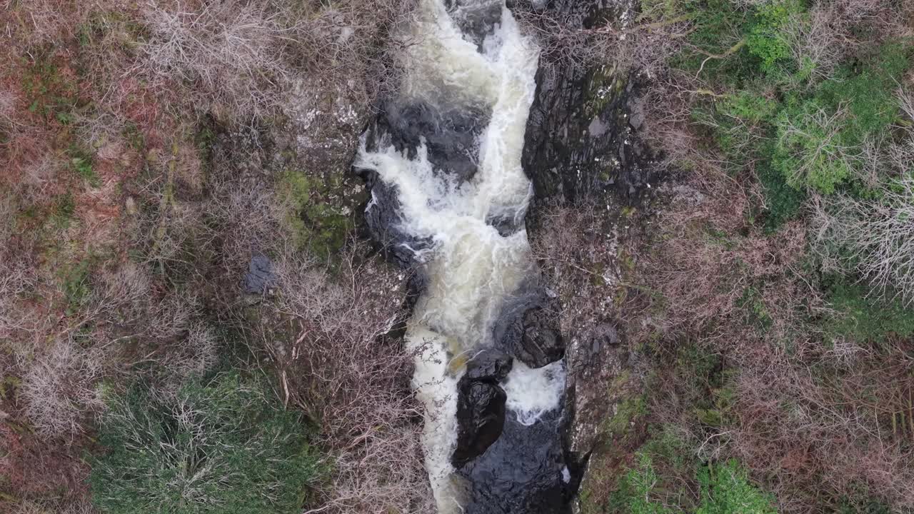 Rushing Stream Over Narrow Rocky River In County Kerry, Ireland. Topdown Shot