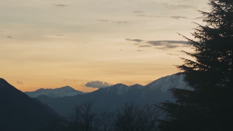 view of snowy alp mountains at sunset