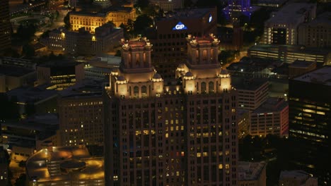 closeup aerial view of 191 peachtree tower in downtown atlanta at night.