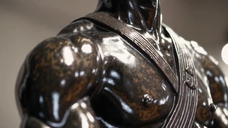 bronze statue of a fighter