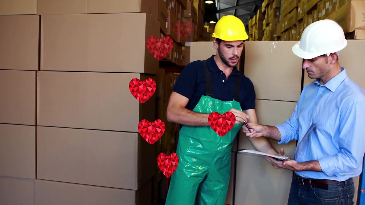 Animazione di icone a forma di cuore su lavoratori maschi caucasici che trasportano scatole