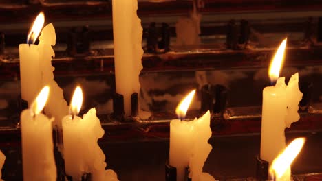 wax candles in the temple in memory of those who died in ukraine