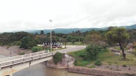 A-bird's-eye-view-of-the-bridge-and-the-entrance-of-the-city-La-Caldera,-in-the-province-of-Salta,-Argentina