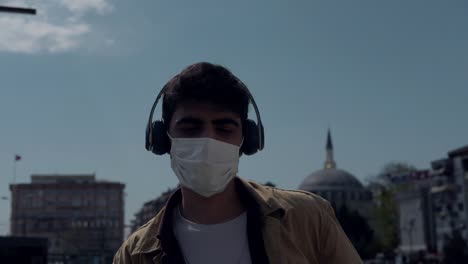 mask wearing headphones