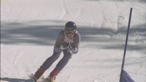 alpine skier running a downhill course 26