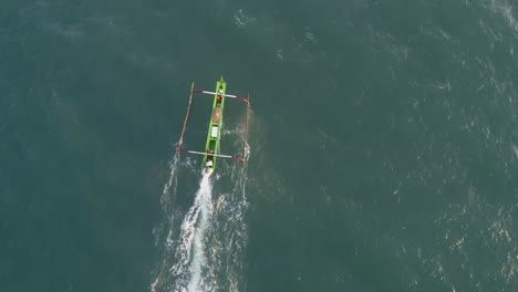 aerial view of an outrigger on the water