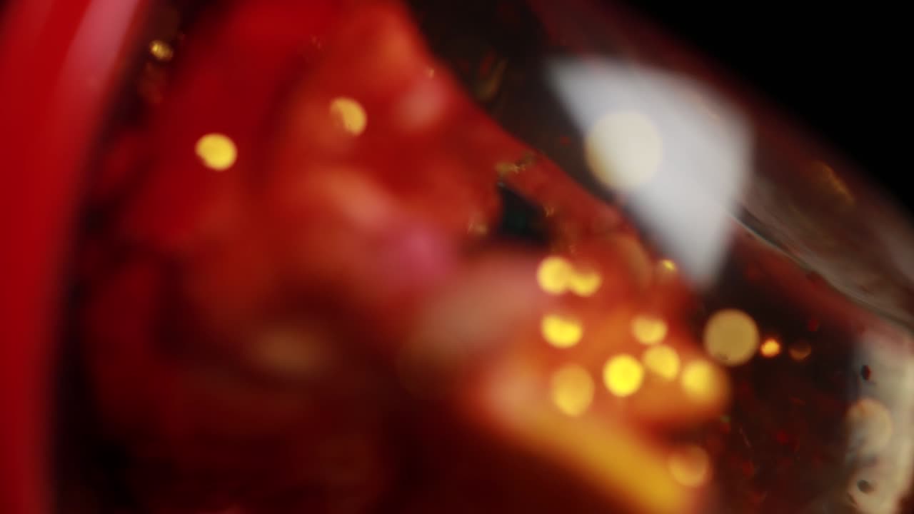 nettipattam borroso bokeh abstracto fondo negro para el telón de fondo, brillantes bokeh brillantes desenfocados y fondos de chispas doradas.