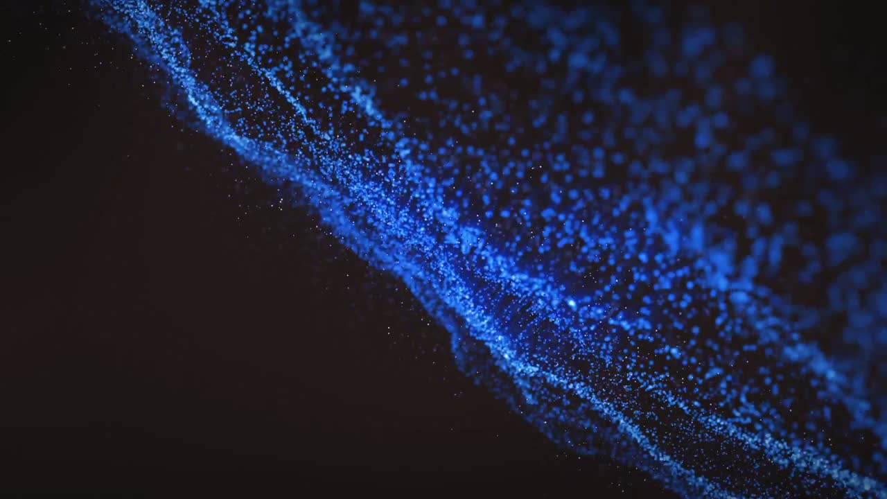 Animation of blue wave of spots on black background