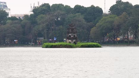 turtle tower amidst serene lake and greenery