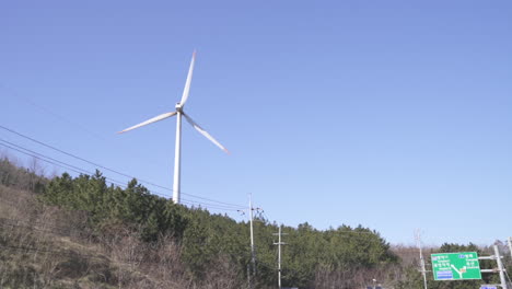 wind turbine generator spinning by wind in south korea (shoot info: cin2, 1080p, 59.94fps)