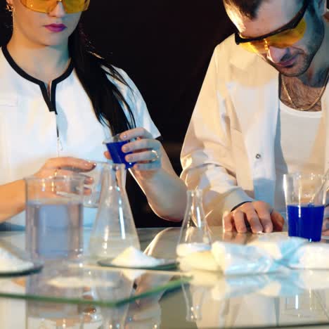 scientific discoveries. two modern scientists working in the medical laboratory were engaged in research.