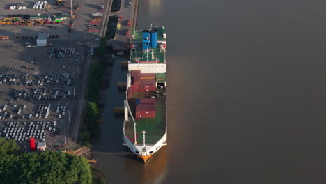 aerial view of huge cargo ship at puerto zarate terminal. economic growth. argentina. 4k.