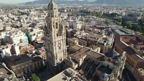 bell tower of murcia cathedral with cityscape, spain