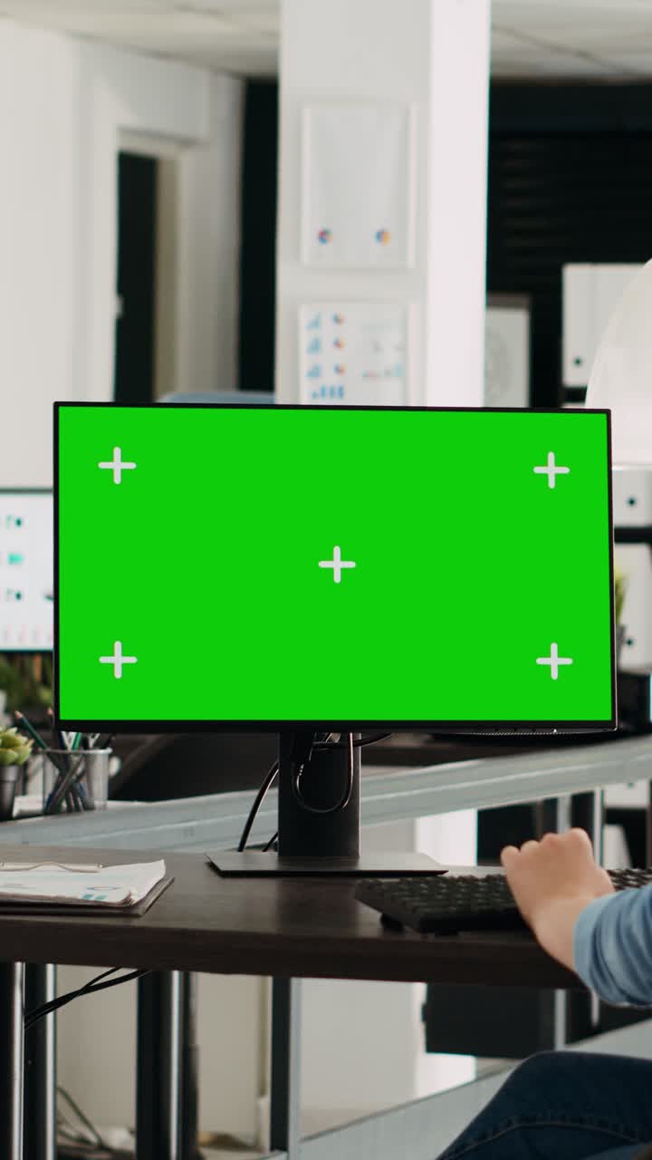 Vertical video Businesswoman looking at greenscreen