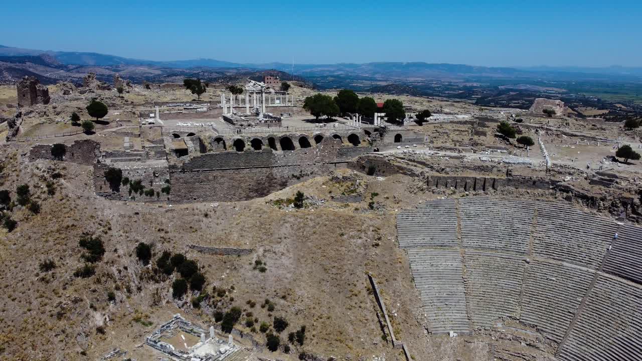 Aerial View of Pergamon Acropolis with Ancient Temple Remains above the modern city of Bergama