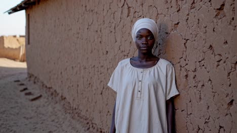 african woman in rural village