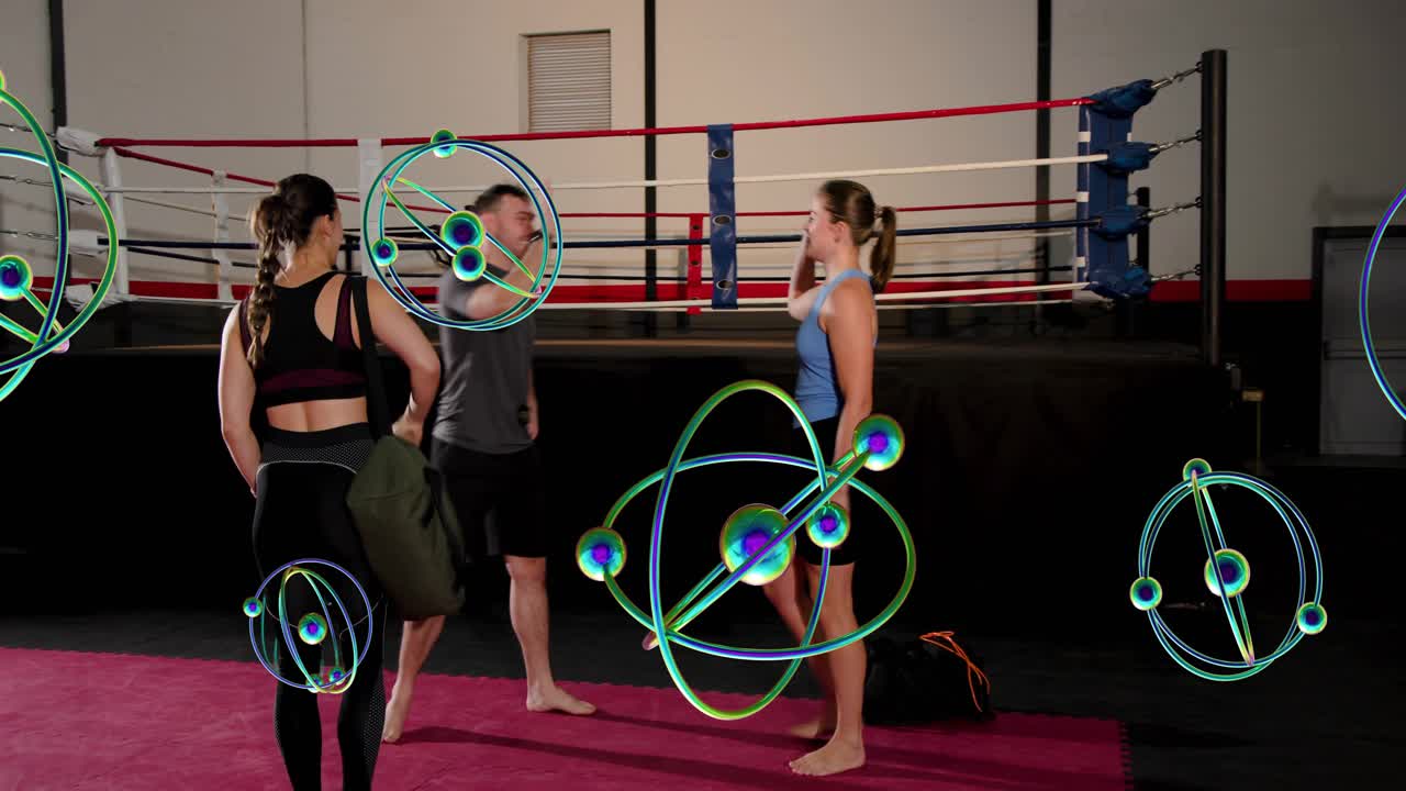 Lead woman and partner walking mat to boxing ring, spawning orbs, high-fiving man before training