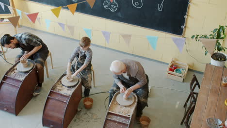 pottery class with students and instructors