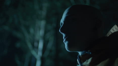 man in the woods at night