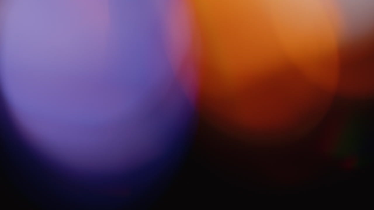 la luz multicolor filtra imágenes de 4k sobre fondo negro, vídeo estilizado, transiciones, efecto bokeh