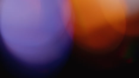 la luz multicolor filtra imágenes de 4k sobre fondo negro, vídeo estilizado, transiciones, efecto bokeh