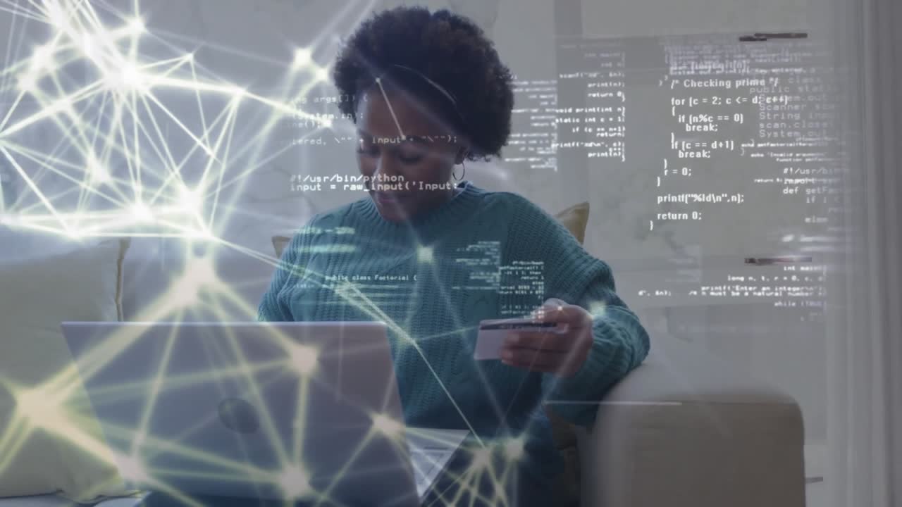 Animation of network of connections over african american woman paying with card over laptop