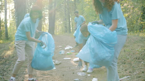 community volunteers cleaning up a forest